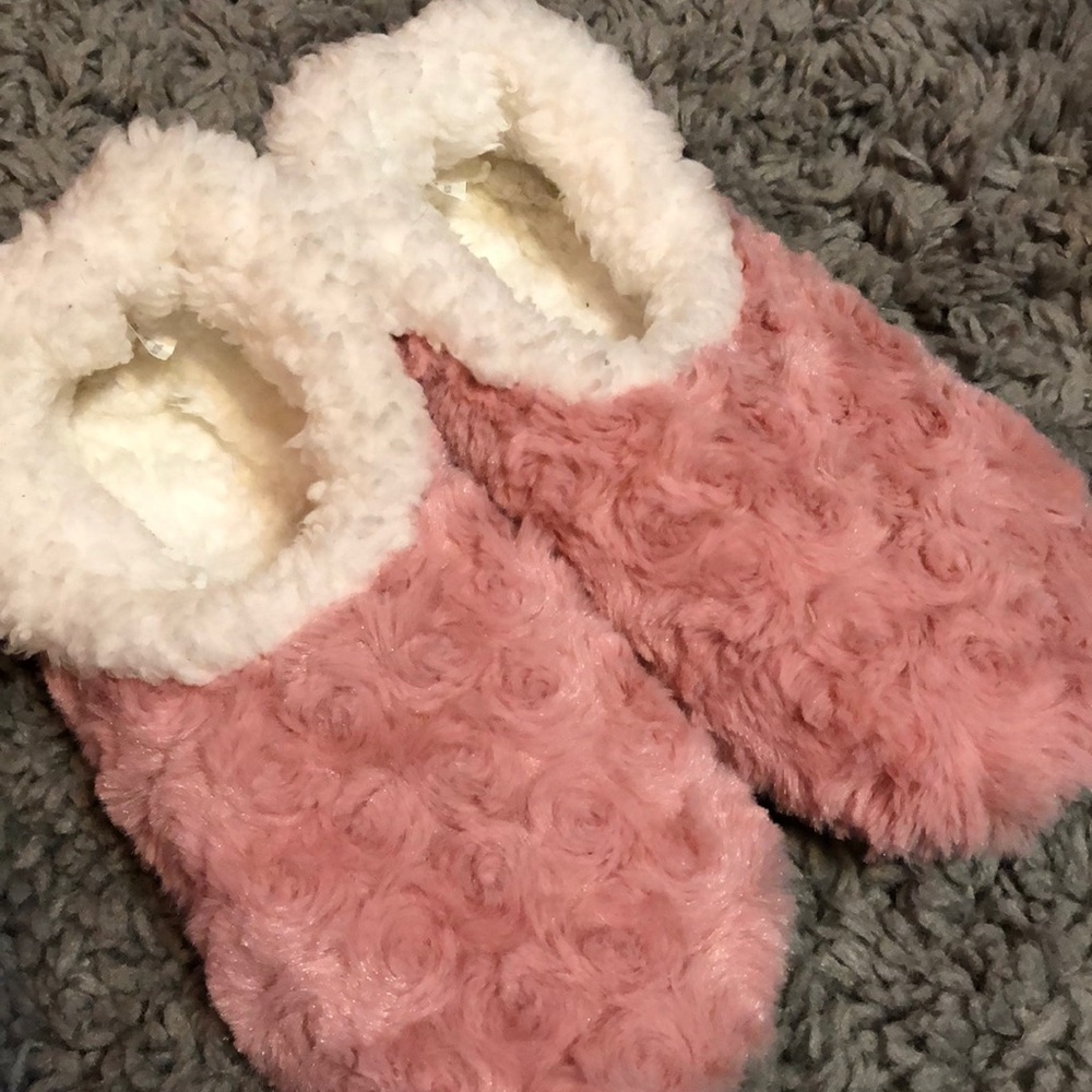 Pink fuzzy slippers